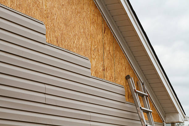 Professional Storm Damage Siding Repair technician working in Northpoint, PA